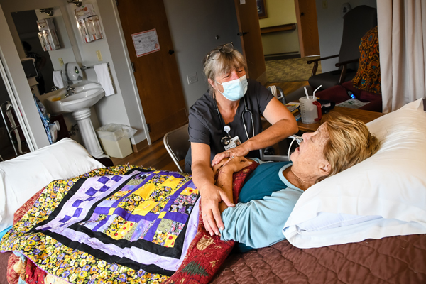 Knute Nelson Hospice nurse visits with patient